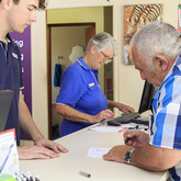 Helping Clients - PostNet Sandbaai - Xplorioâ„¢ Hermanus