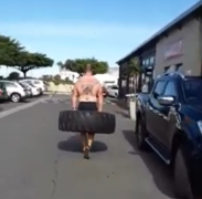 ManÂ Witnessed Carrying Tractor Tyre