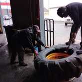 Fitting of digger = loader tyres on rim - Gansbaai Fitment Centre