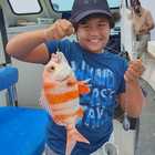Boy Enjoying Boat Angling Trip - Awesome Charters - Agulhas/Struisbaai
