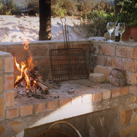 Fireplace - Vleiroos Cottage @ Sandberg Fynbos Reserve - Xplorioâ„¢ Gansbaai