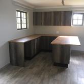Formica Saxon Oak Tops with Monument Oak Melawood Doors - PCF Kitchens - Xplorioâ„¢ Pringle Bay