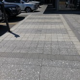 Nacre Polished Abalone Concrete Pavers 900x450x40mm Charcoal with Black Stone - Client (Checkers Constantia Emporium) - Cape Stone - Xplorioâ„¢ Hermanus