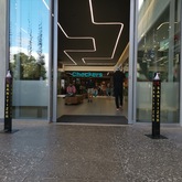 Nacre Polished Abalone Concrete Pavers 900x450x40mm Charcoal with Black Stone - Client (Checkers Constantia Emporium) - Cape Stone - Xplorioâ„¢ Hermanus