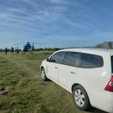 Dropping off people at the helipad that came for shark cage diving - D&J Tours - Xplorioâ„¢ Gansbaai