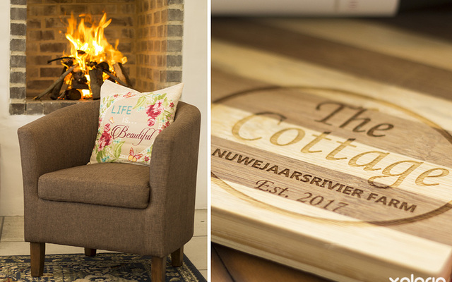 kleinmond_accommodation_njr_cottage_fire_place_cutting_board_1537944385_1632382020