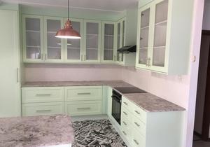 Kitchen with Granite Tops and Pistachio GreenÂ Doors and Panels