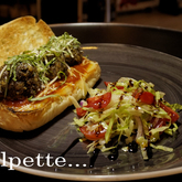 This is Panino Polpette with a little side salad. A deliciously tempting and Italian Deli style light lunch. You can take one away or you can enjoy it here with a glass of wine. Dal-Italia, creating an exclusive shopping and dining experience in Hermanus - Dal-Italia Delicatessen - Xplorioâ„¢ Hermanus