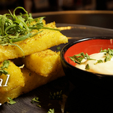 A light Italian nibble, Polenta sticks with Aioli sauce. A perfect companion to your morning coffee or a lunchtime glass. Dal-Italia, creating a unique dining and shopping experience in Hermanus - Dal-Italia Delicatessen - Xplorioâ„¢ Hermanus