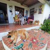 Enjoying coffee on the front stoep - Foxy House - Xplorioâ„¢ Gansbaai