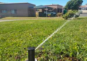 Green Grass with an Irrigation System
