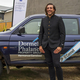 JP With Car - Dormehl Phalane Property Group Overstrand - Xplorioâ„¢ Gansbaai 