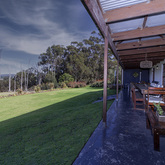 Groenvy View of Veranda- Beloftebos Farm Cottages - Xplorioâ„¢ Stanford