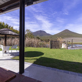 Light Cottage Entertainment Area - Beloftebos Farm Cottages - Xplorioâ„¢ Stanford