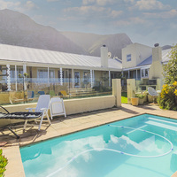 Relaxing Swimming Pool Area - Fijnbos Manor - Xplorioâ„¢ Betty's Bay