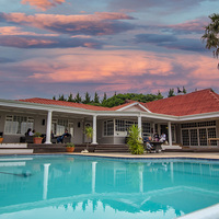 Sunset View From Pool Area - Schneiderâ€™s Cape Floral Kitchen - Xplorioâ„¢ Gansbaai 